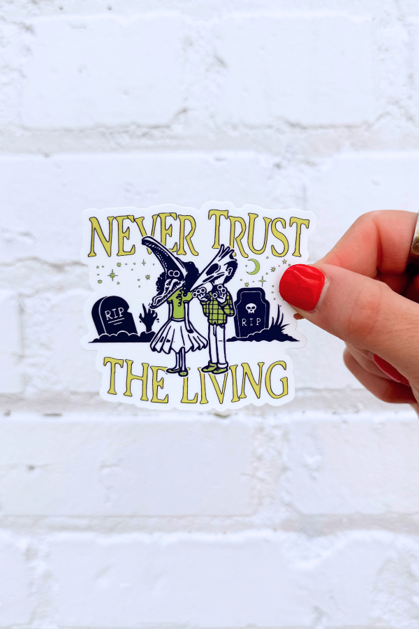 Never Trust The Living Sticker - Girl Tribe Co. Spooky Szn Collection